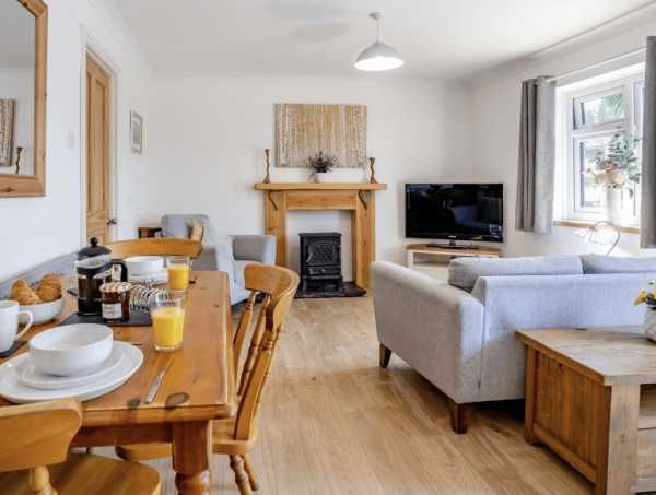 The Cottage - cozy living room with fireplace